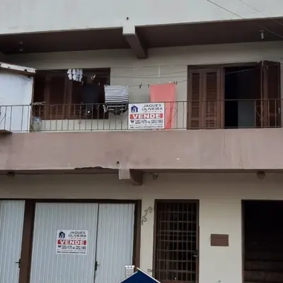 Imagem de Predio com tres Kit nets e garagem