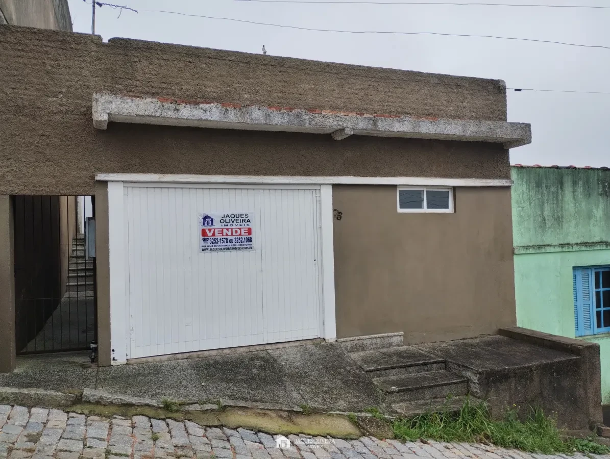 Imagem de Casa 03 dormitórios, garagem no bairro Triângulo.