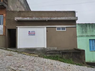 Imagem de Casa 03 dormitórios, garagem no bairro Triângulo.