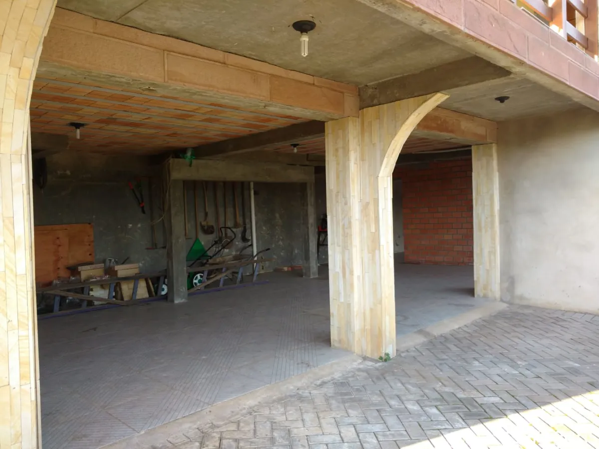 Imagem de Refúgio exclusivo com alto padrão e muito verde em Taquara/RS. Residência encantadora com piscina e espaço gourmet.