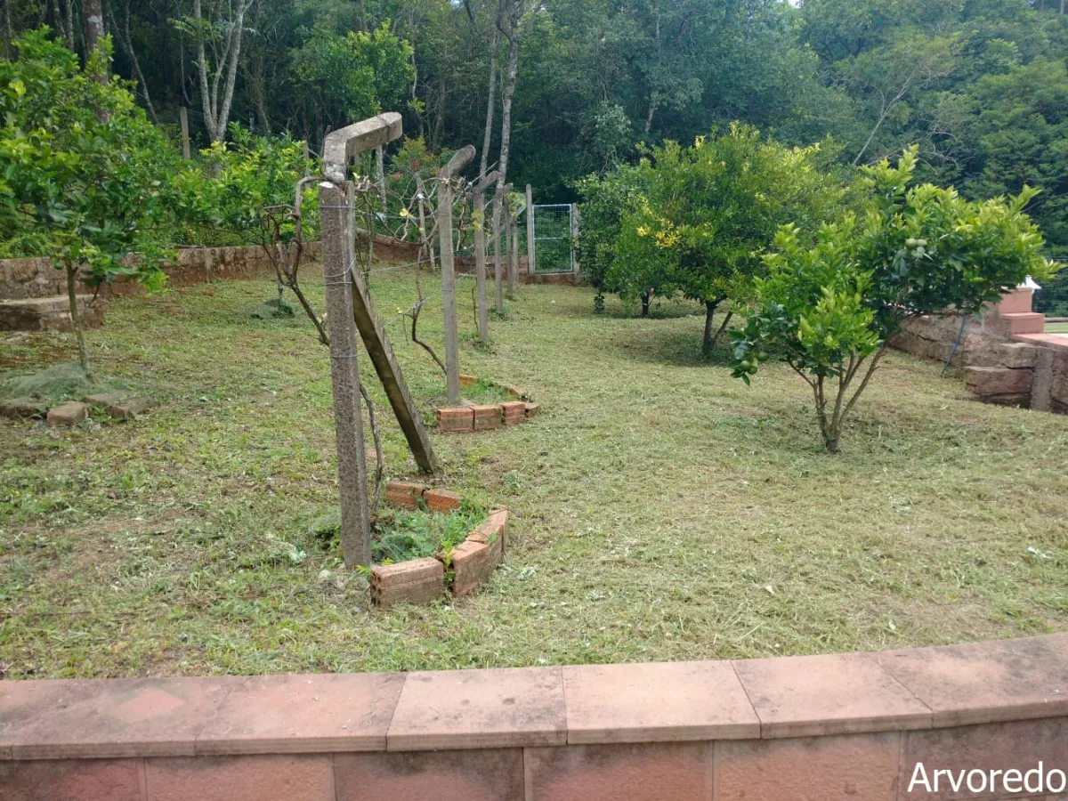 Imagem de Refúgio exclusivo com alto padrão e muito verde em Taquara/RS. Residência encantadora com piscina e espaço gourmet.