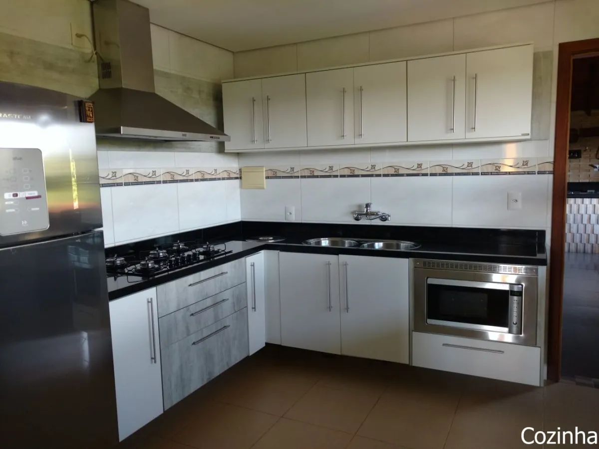 Imagem de Refúgio exclusivo com alto padrão e muito verde em Taquara/RS. Residência encantadora com piscina e espaço gourmet.