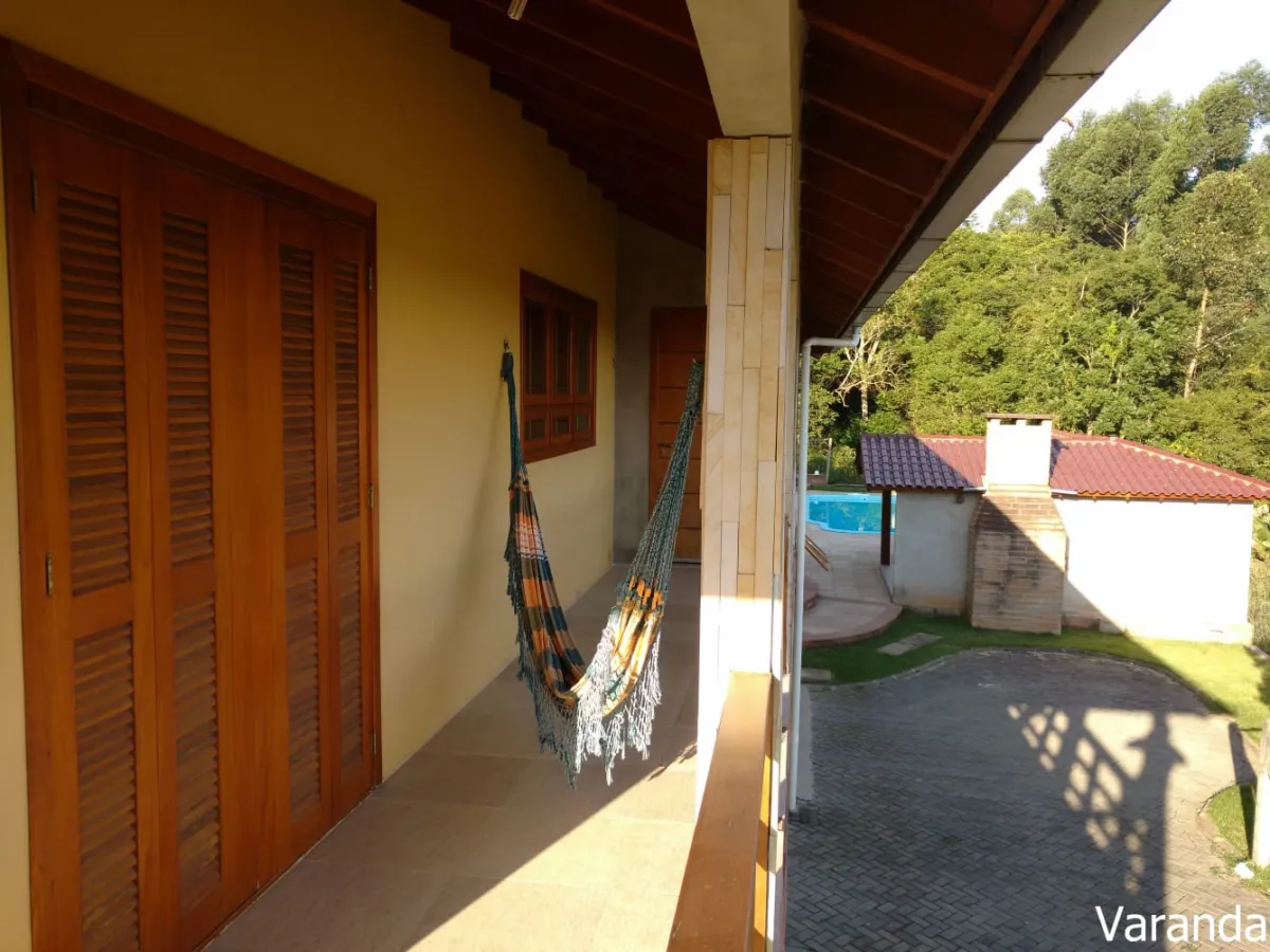 Imagem de Refúgio exclusivo com alto padrão e muito verde em Taquara/RS. Residência encantadora com piscina e espaço gourmet.