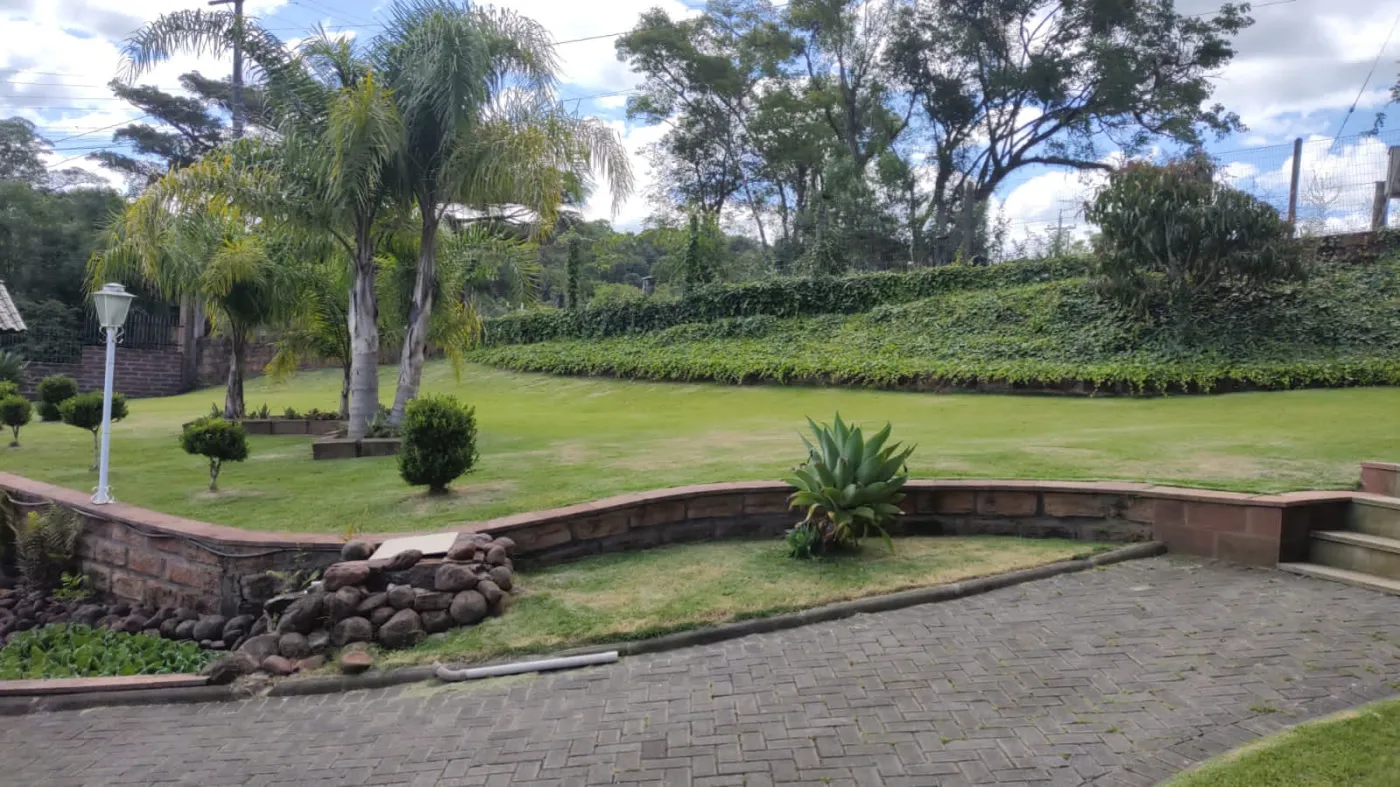 Imagem de Refúgio exclusivo com alto padrão e muito verde em Taquara/RS. Residência encantadora com piscina e espaço gourmet.