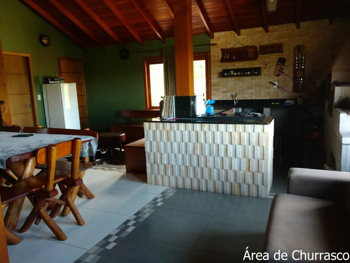 Imagem de Refúgio exclusivo com alto padrão e muito verde em Taquara/RS. Residência encantadora com piscina e espaço gourmet.