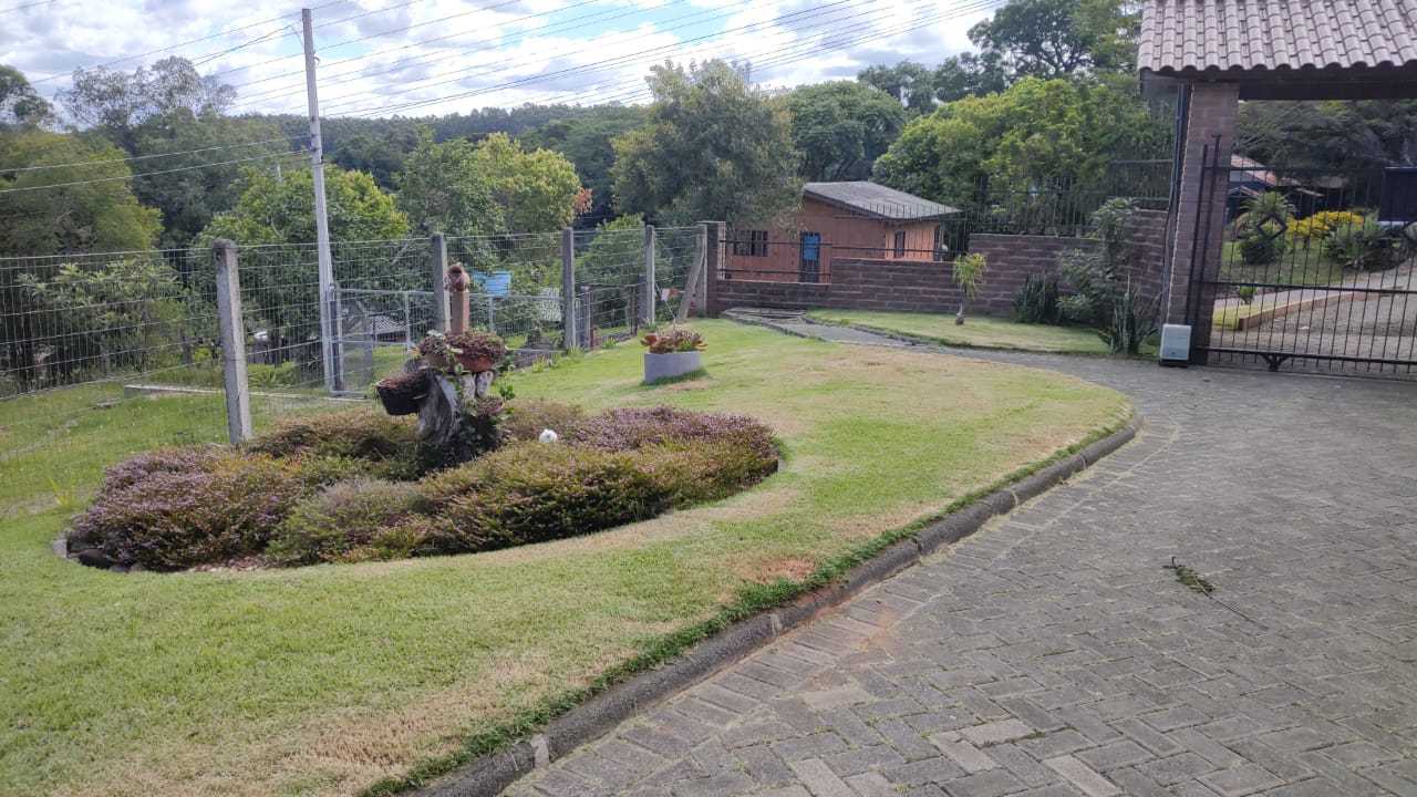 Imagem de Refúgio exclusivo com alto padrão e muito verde em Taquara/RS. Residência encantadora com piscina e espaço gourmet.