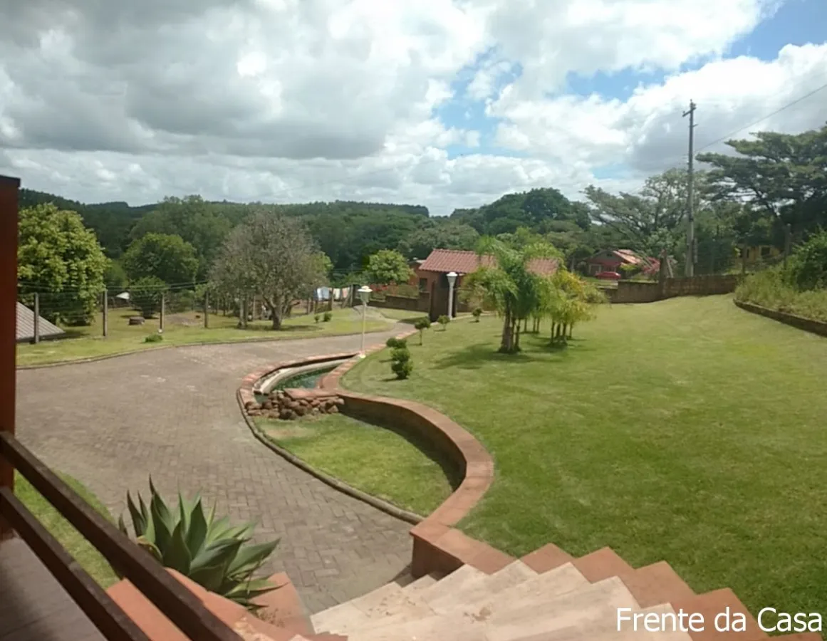 Imagem de Refúgio exclusivo com alto padrão e muito verde em Taquara/RS. Residência encantadora com piscina e espaço gourmet.