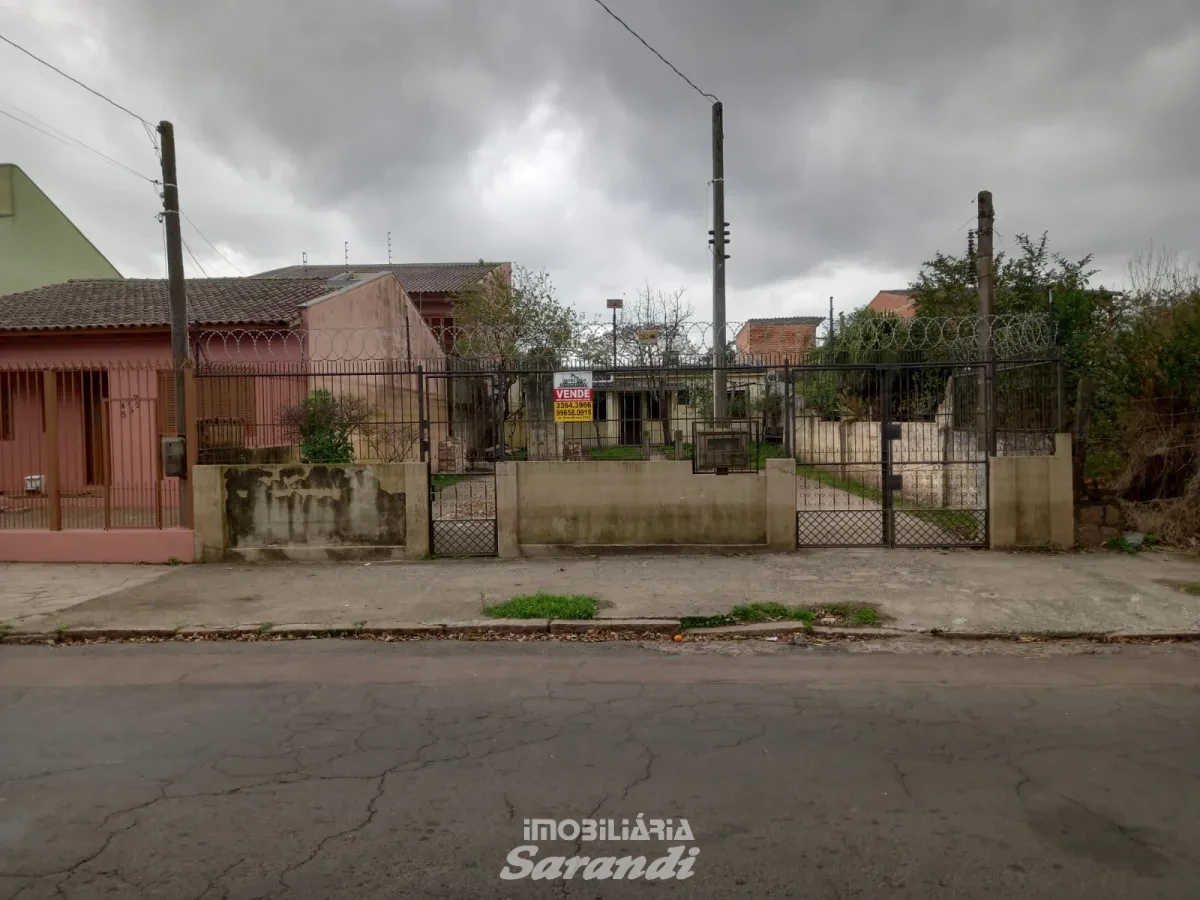 Imagem de Terreno com uma casa de alvenaria nos fundos bairro sarandi Porto Alegre