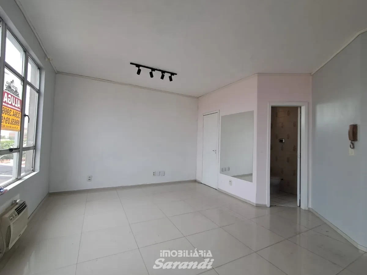 Imagem de Sala comercial com área aproximada 25m², piso porcelanato