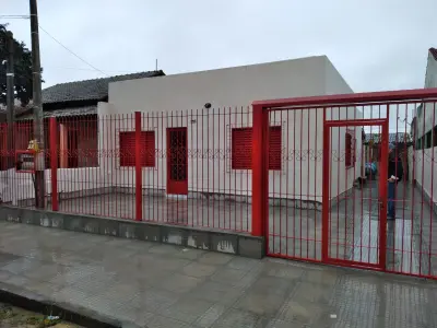Imagem de Casa de alvenaria três dormitórios e casa fundos dois dormitórios bairro sarandi Porto Alegre