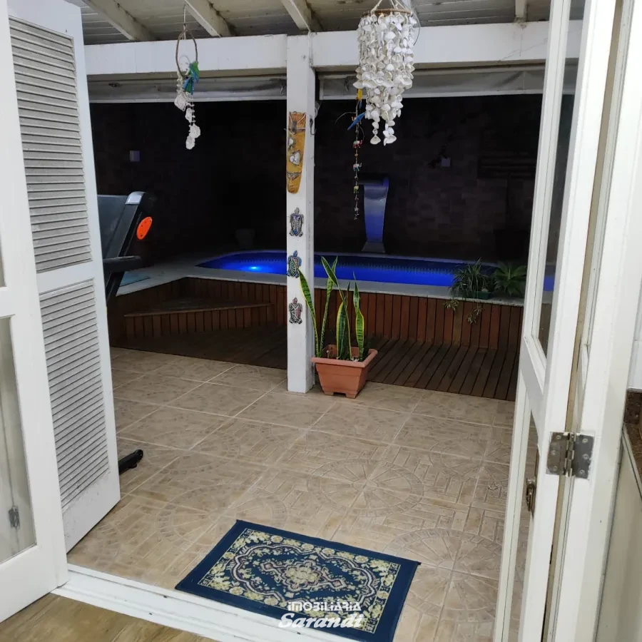 Imagem de Casa três dormitórios uma suíte, pergolado com piscina bairro sarandi Porto Alegre