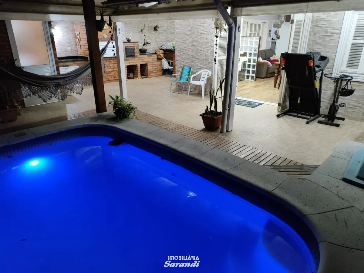 Imagem de Casa três dormitórios uma suíte, pergolado com piscina bairro sarandi Porto Alegre
