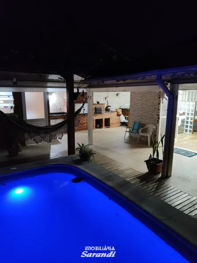 Imagem de Casa três dormitórios uma suíte, pergolado com piscina bairro sarandi Porto Alegre