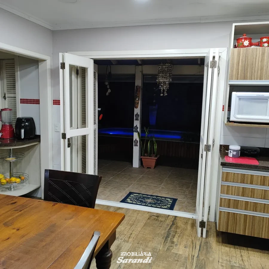 Imagem de Casa três dormitórios uma suíte, pergolado com piscina bairro sarandi Porto Alegre