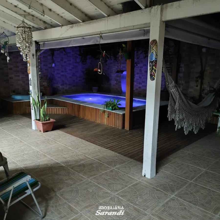 Imagem de Casa três dormitórios uma suíte, pergolado com piscina bairro sarandi Porto Alegre