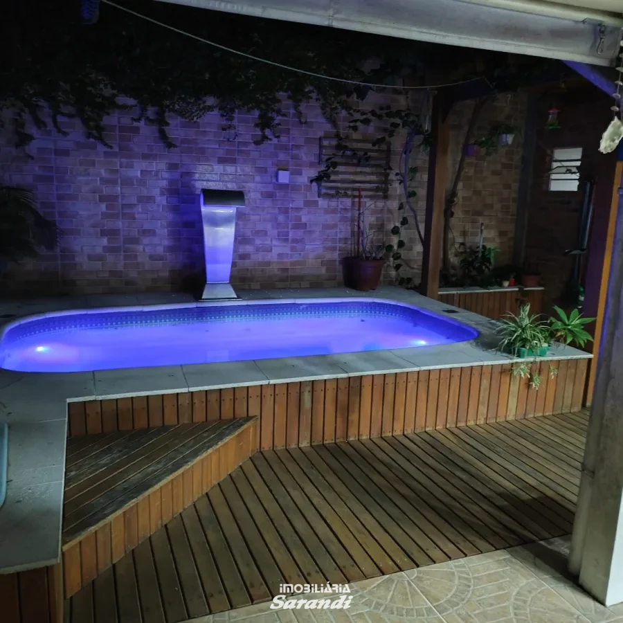 Imagem de Casa três dormitórios uma suíte, pergolado com piscina bairro sarandi Porto Alegre
