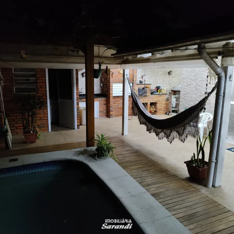 Imagem de Casa três dormitórios uma suíte, pergolado com piscina bairro sarandi Porto Alegre