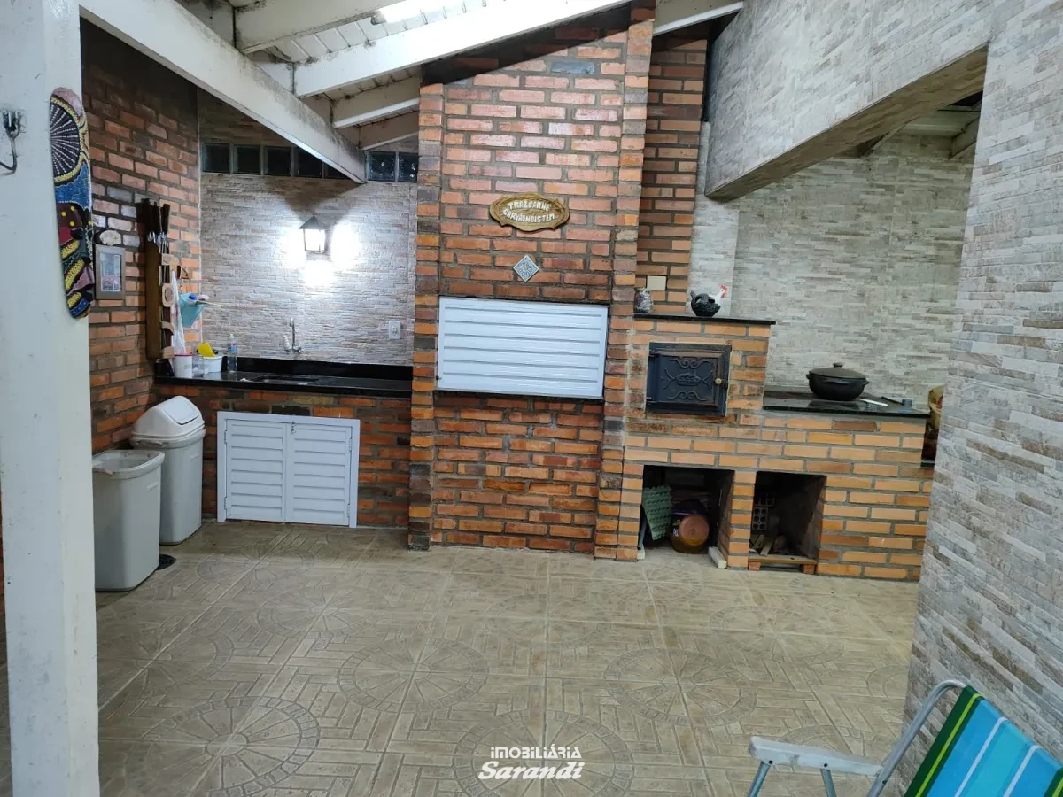 Imagem de Casa três dormitórios uma suíte, pergolado com piscina bairro sarandi Porto Alegre
