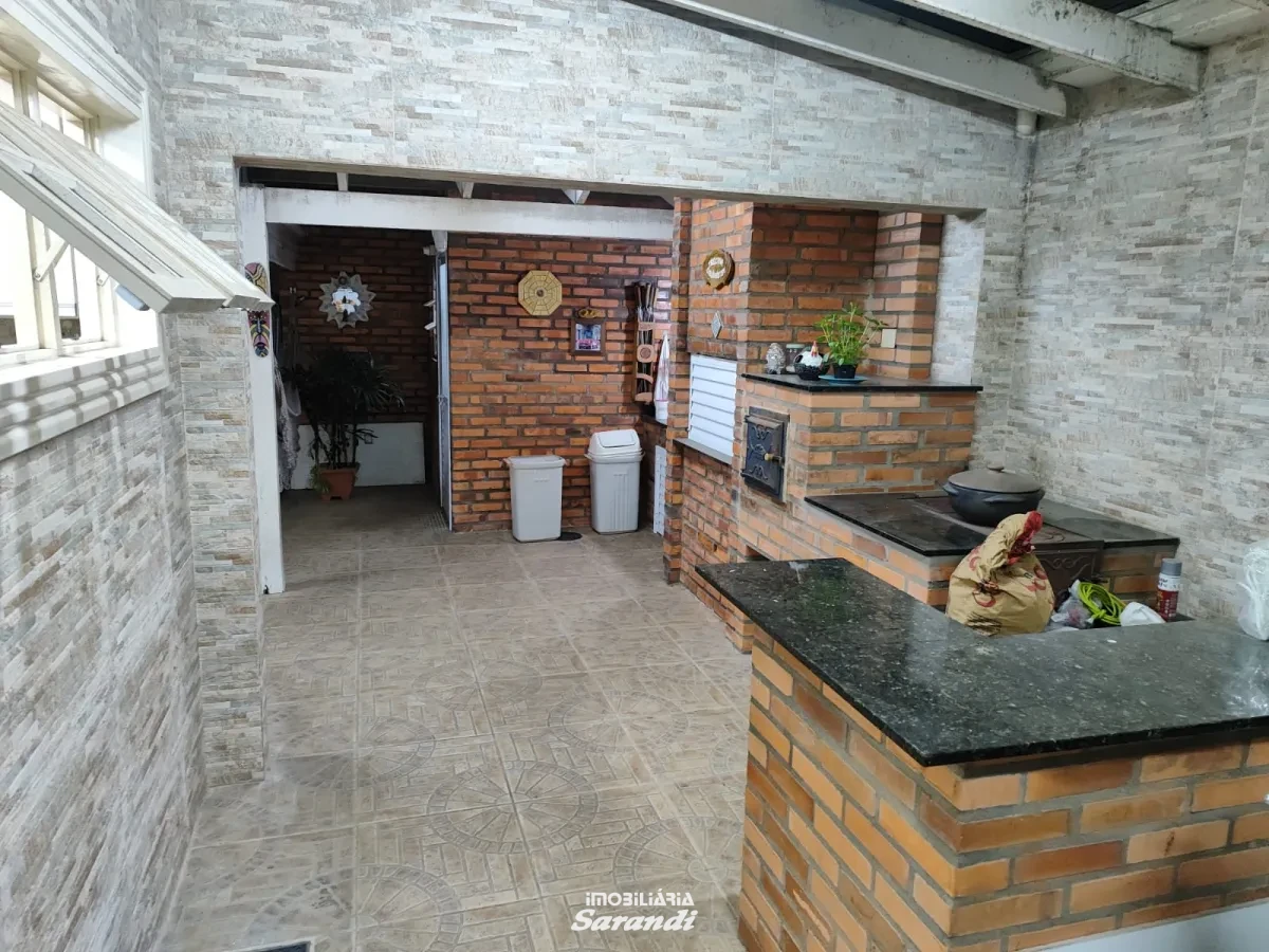 Imagem de Casa três dormitórios uma suíte, pergolado com piscina bairro sarandi Porto Alegre