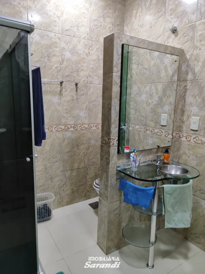 Imagem de Casa três dormitórios uma suíte, pergolado com piscina bairro sarandi Porto Alegre