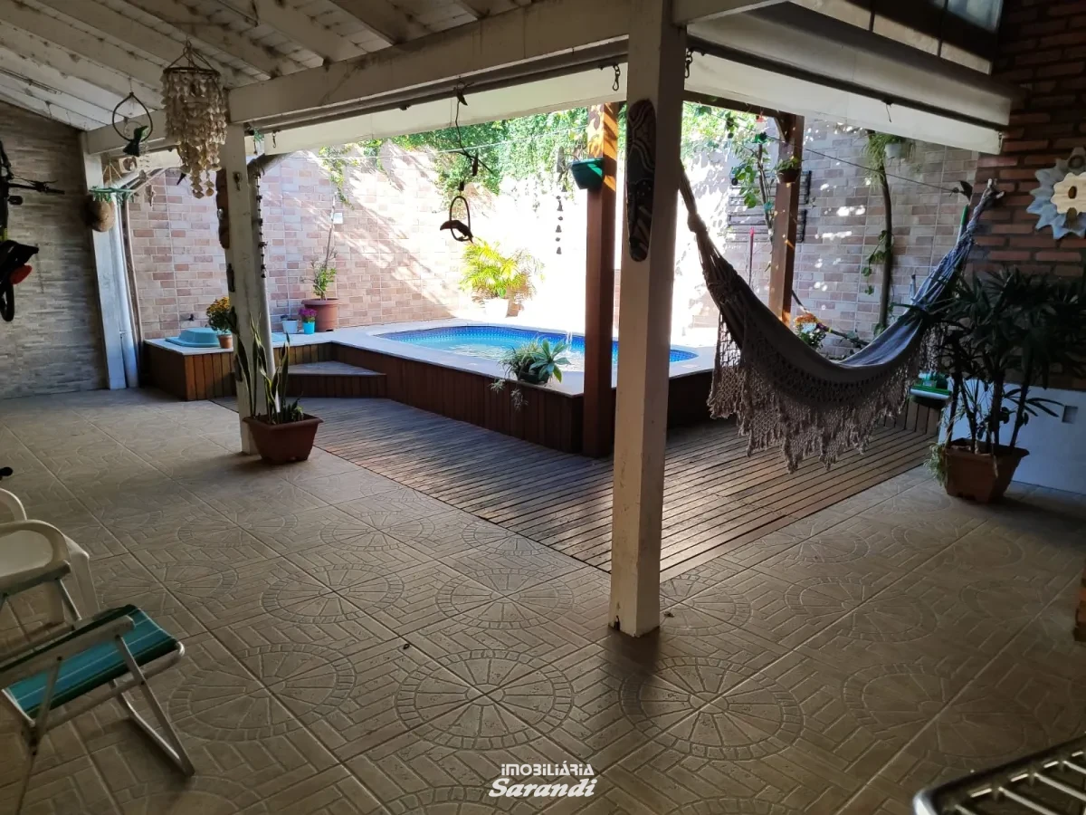 Imagem de Casa três dormitórios uma suíte, pergolado com piscina bairro sarandi Porto Alegre
