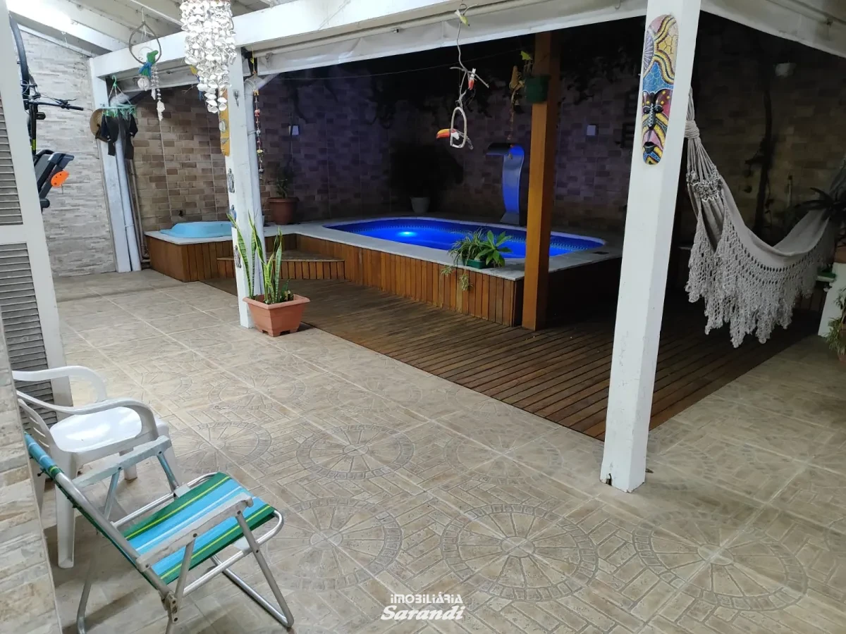 Imagem de Casa três dormitórios uma suíte, pergolado com piscina bairro sarandi Porto Alegre