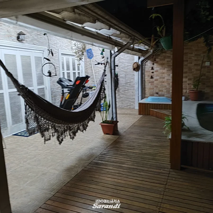 Imagem de Casa três dormitórios uma suíte, pergolado com piscina bairro sarandi Porto Alegre