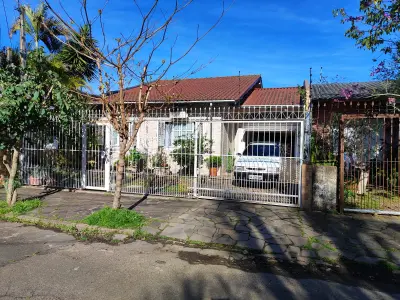 Imagem de Casa três dormitórios uma suíte, pergolado com piscina bairro sarandi Porto Alegre