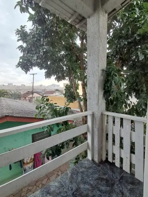 Imagem de Sobrado para locação com 2 dormitórios, sendo um deles suíte - Pátio compartilhado.