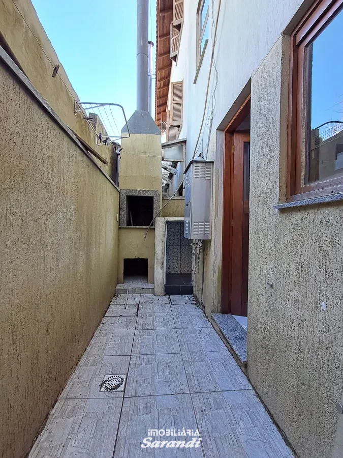 Imagem de Sobrado em condomínio de 3 dormitórios no bairro Sarandi com vaga.
