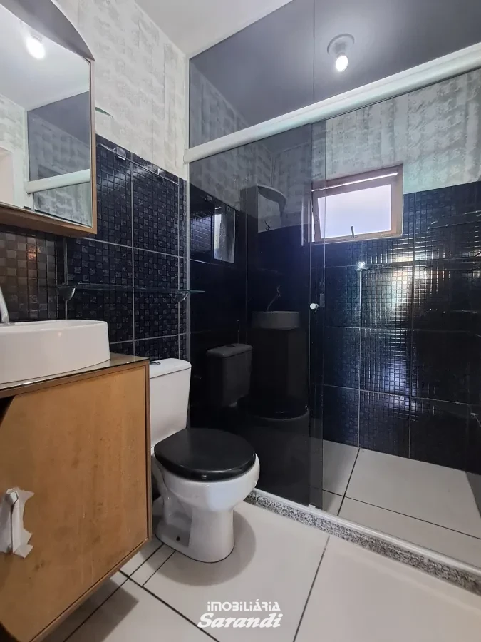 Imagem de Sobrado em condomínio de 3 dormitórios no bairro Sarandi com vaga.