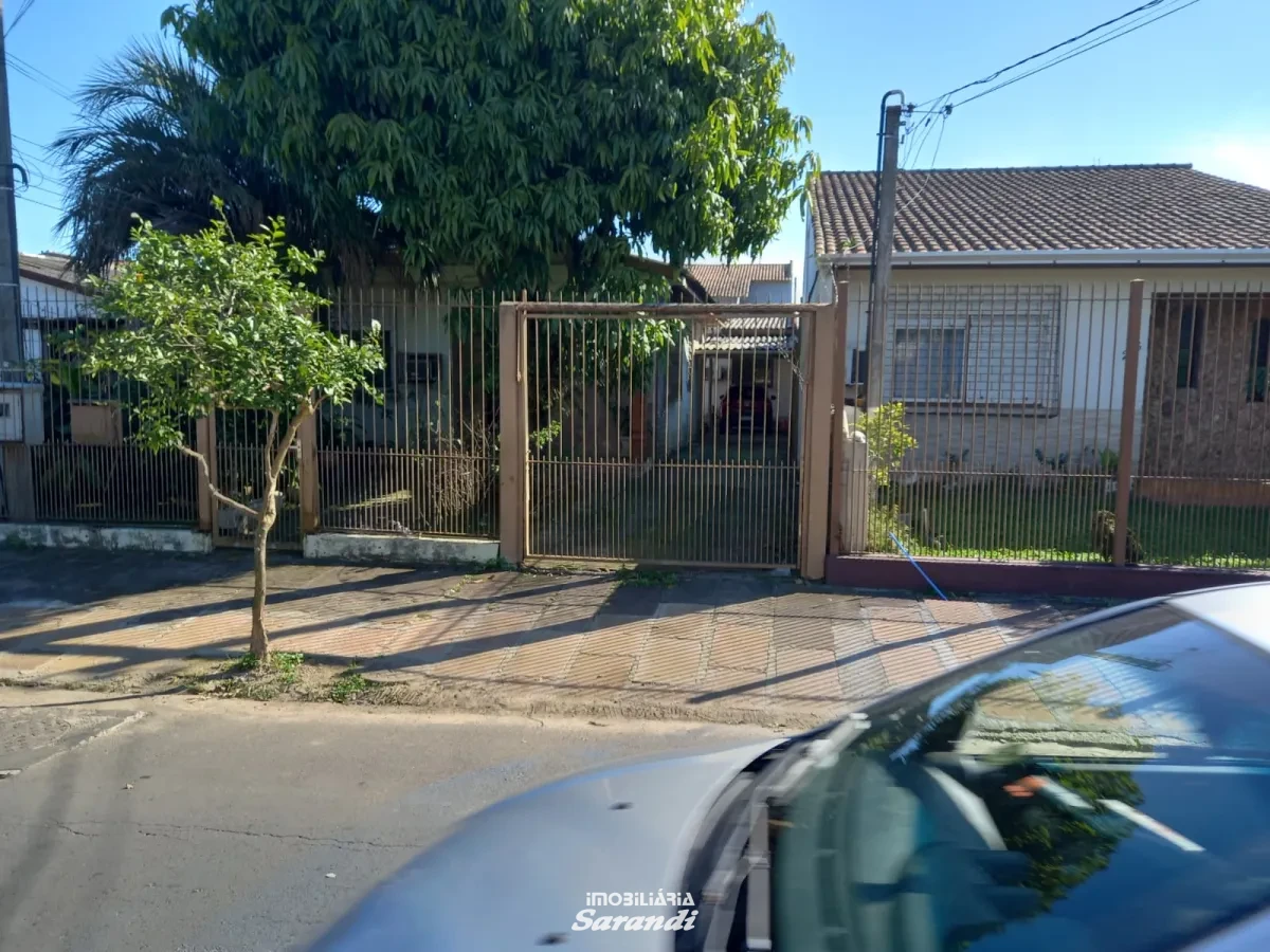 Imagem de Casa de alvenaria na frente com três dormitórios área de  77,00m² e outra nos fundos dois dormitórios área de 60,00m² bairro sarandi Porto Alegre