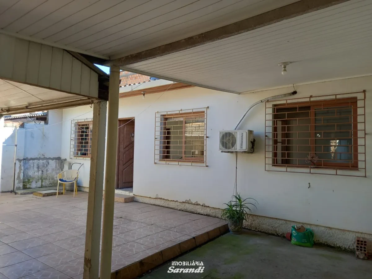 Imagem de Casa de alvenaria na frente com três dormitórios área de  77,00m² e outra nos fundos dois dormitórios área de 60,00m² bairro sarandi Porto Alegre
