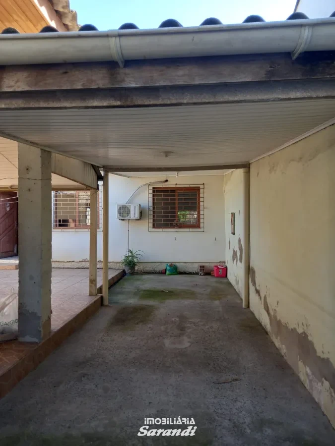 Imagem de Casa de alvenaria na frente com três dormitórios área de  77,00m² e outra nos fundos dois dormitórios área de 60,00m² bairro sarandi Porto Alegre