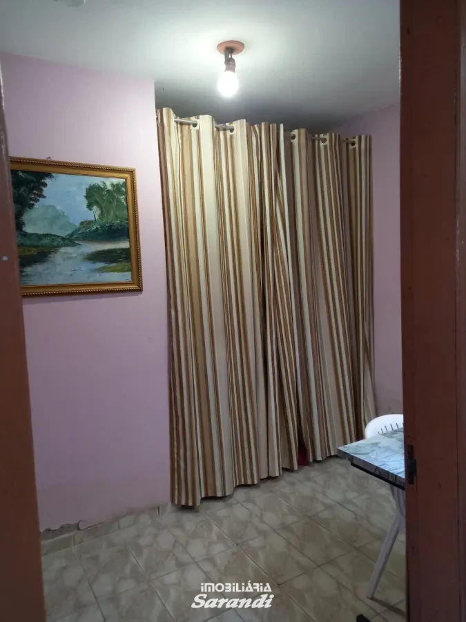 Imagem de Casa de alvenaria na frente com três dormitórios área de  77,00m² e outra nos fundos dois dormitórios área de 60,00m² bairro sarandi Porto Alegre