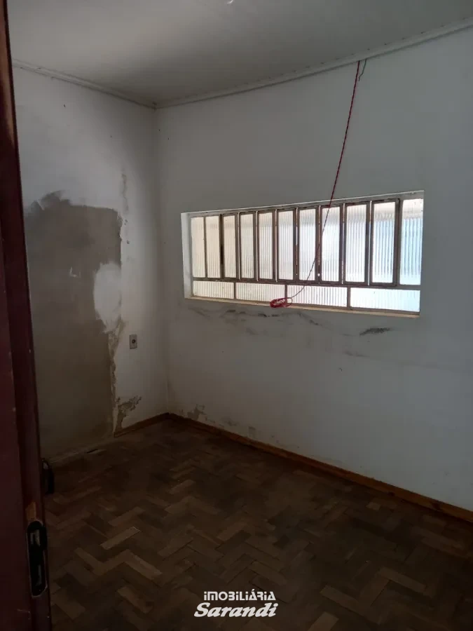 Imagem de Casa de alvenaria na frente com três dormitórios área de  77,00m² e outra nos fundos dois dormitórios área de 60,00m² bairro sarandi Porto Alegre