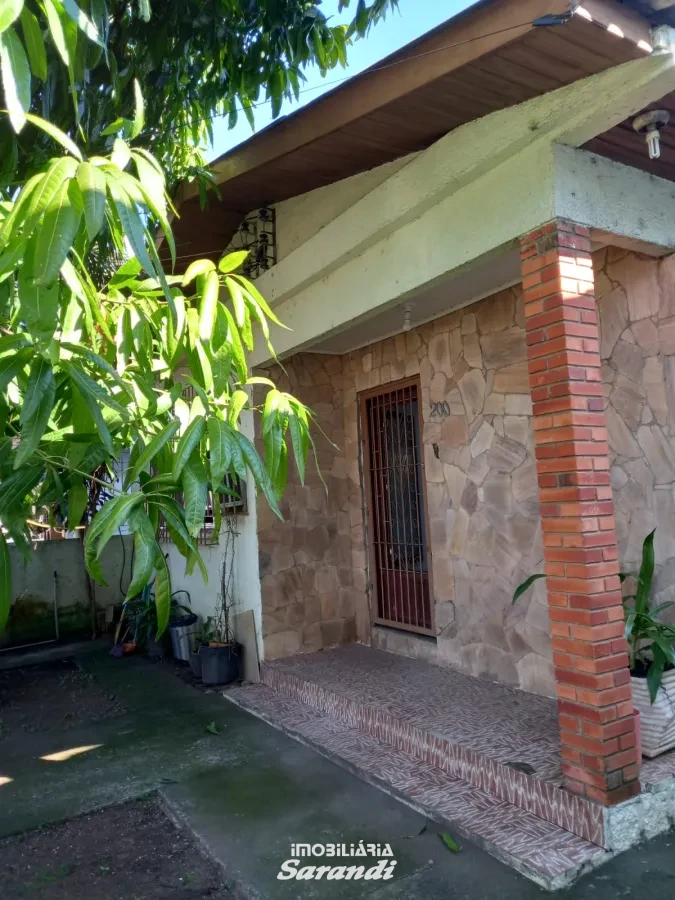 Imagem de Casa de alvenaria na frente com três dormitórios área de  77,00m² e outra nos fundos dois dormitórios área de 60,00m² bairro sarandi Porto Alegre