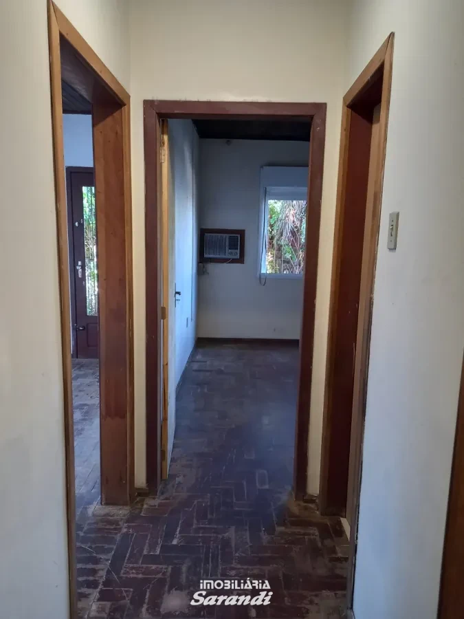 Imagem de Casa de alvenaria na frente com três dormitórios área de  77,00m² e outra nos fundos dois dormitórios área de 60,00m² bairro sarandi Porto Alegre