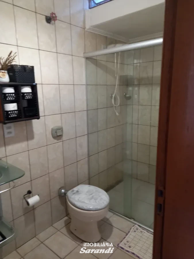 Imagem de Casa de alvenaria na frente com três dormitórios área de  77,00m² e outra nos fundos dois dormitórios área de 60,00m² bairro sarandi Porto Alegre