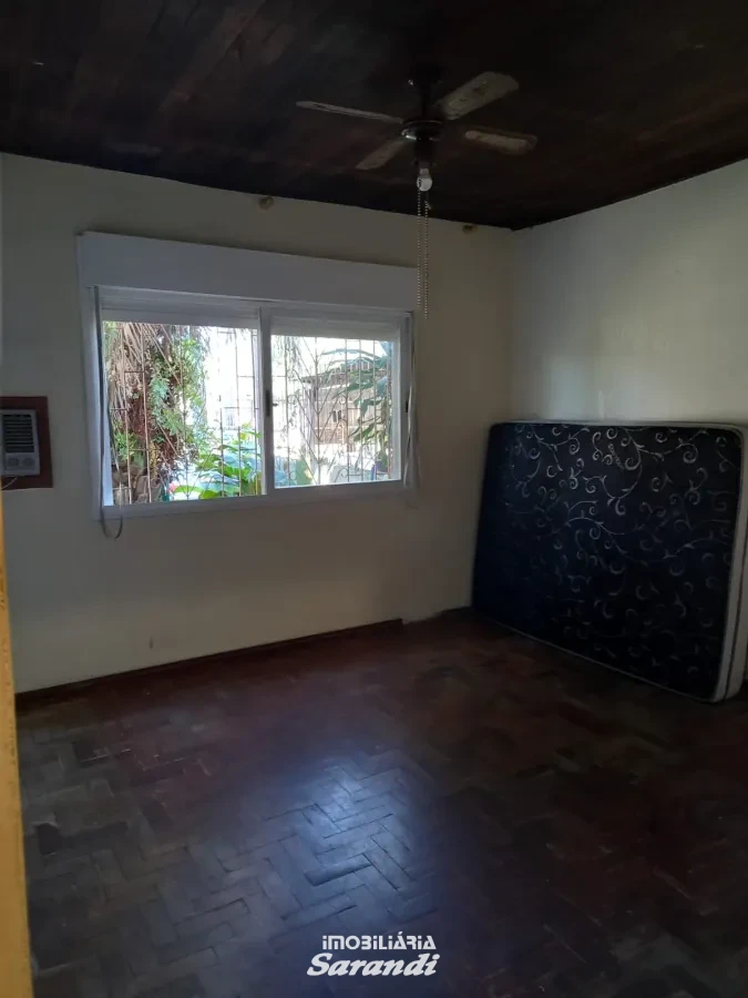 Imagem de Casa de alvenaria na frente com três dormitórios área de  77,00m² e outra nos fundos dois dormitórios área de 60,00m² bairro sarandi Porto Alegre