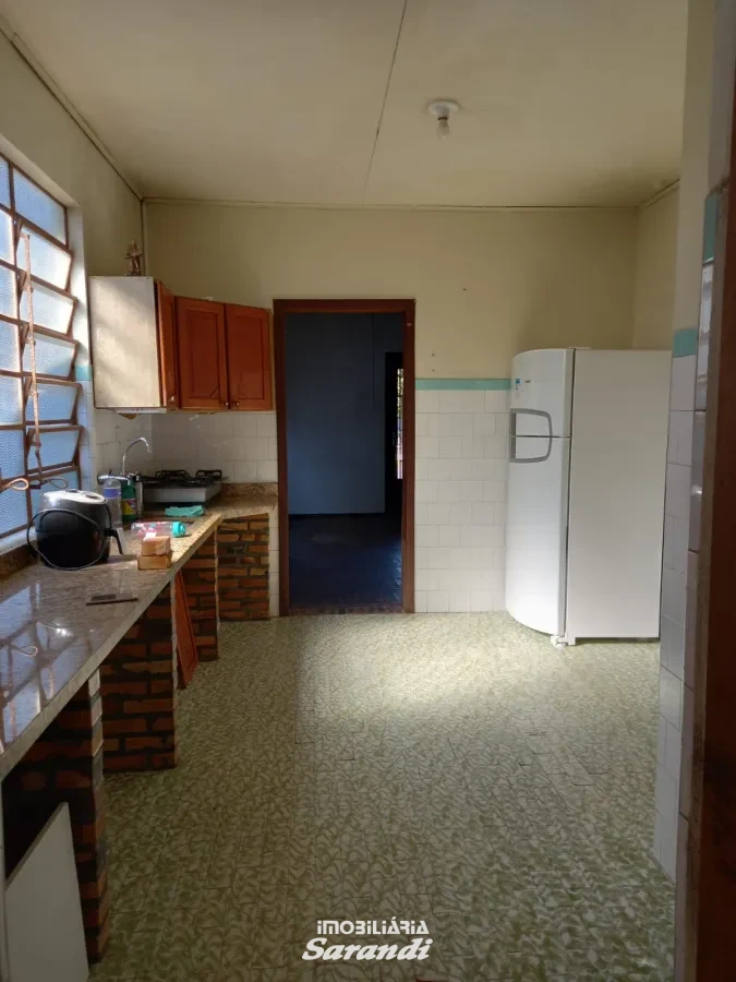 Imagem de Casa de alvenaria na frente com três dormitórios área de  77,00m² e outra nos fundos dois dormitórios área de 60,00m² bairro sarandi Porto Alegre