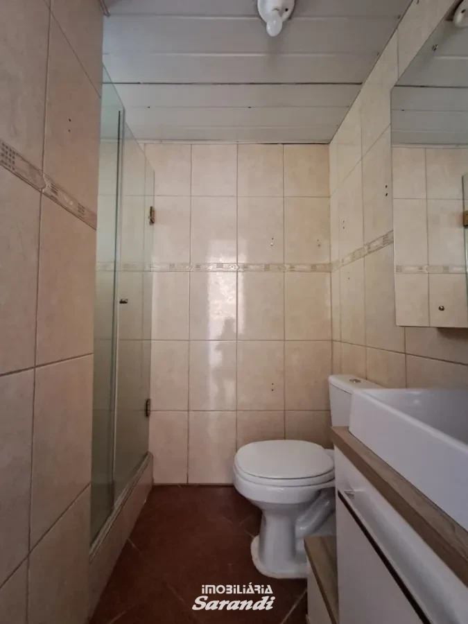 Imagem de Apartamento térreo com 2 dormitórios e vaga de garagem.