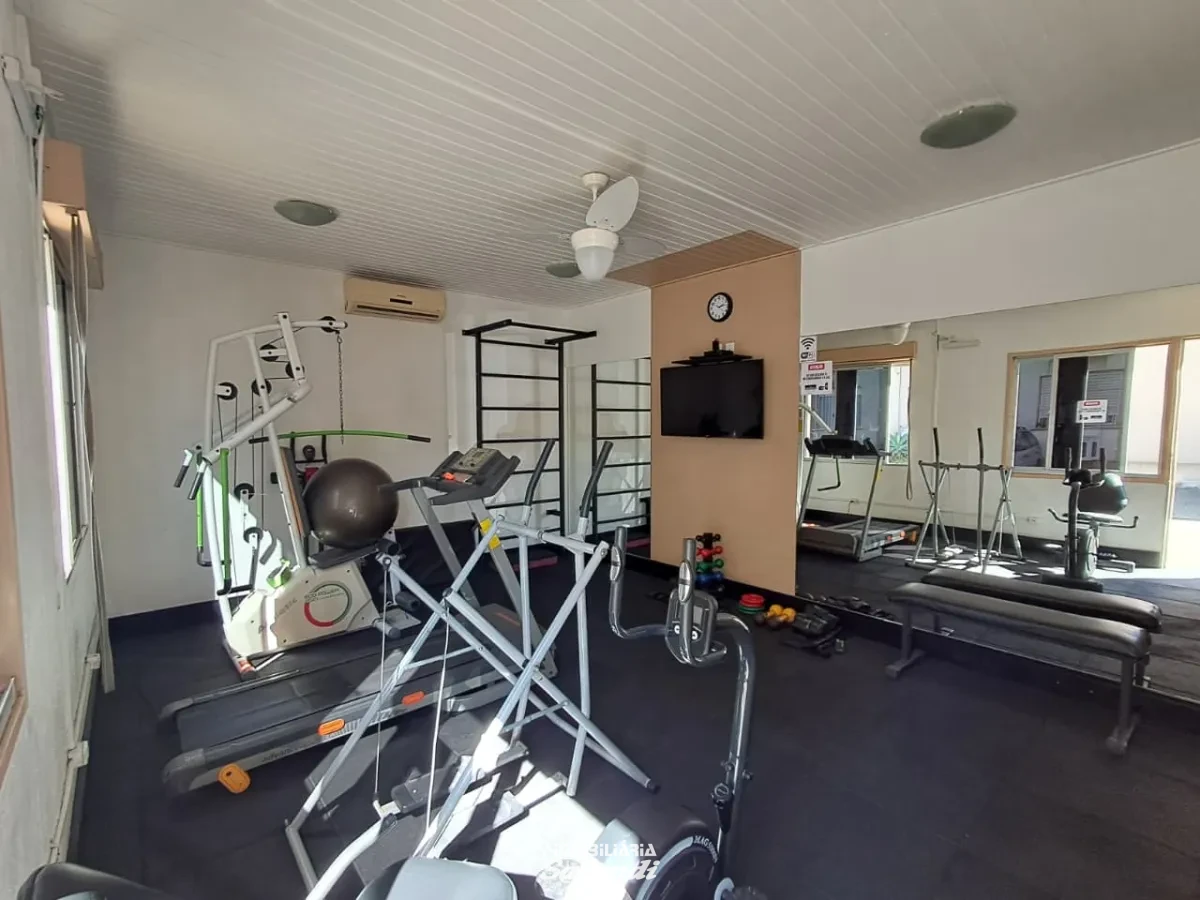Imagem de Apartamento térreo com 2 dormitórios e vaga de garagem.
