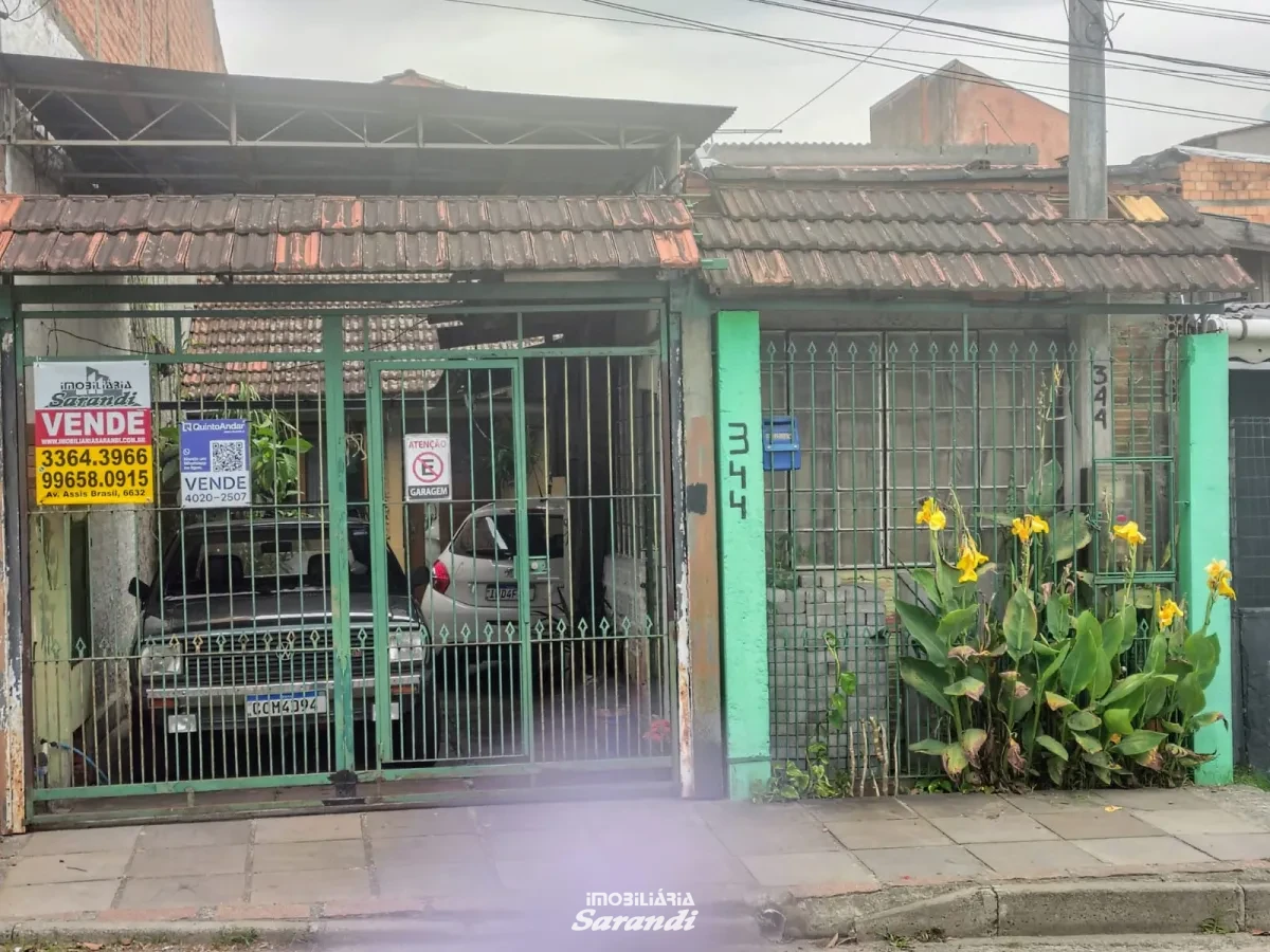 Imagem de Casa de Alvenaria com três dormitórios com garagem situada no bairro Costa e Silva Porto Alegre