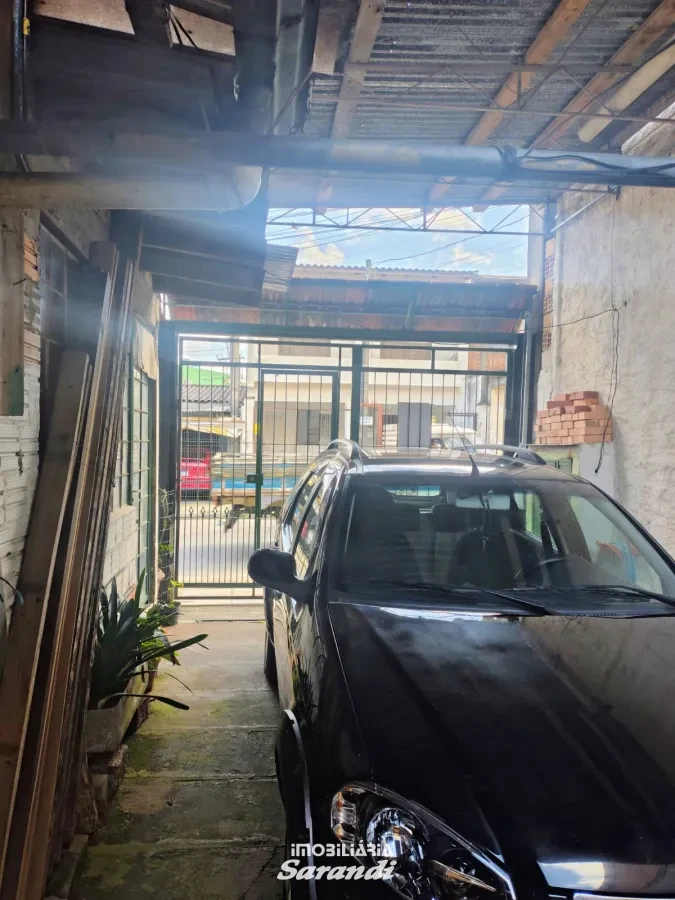 Imagem de Casa de Alvenaria com três dormitórios com garagem situada no bairro Costa e Silva Porto Alegre