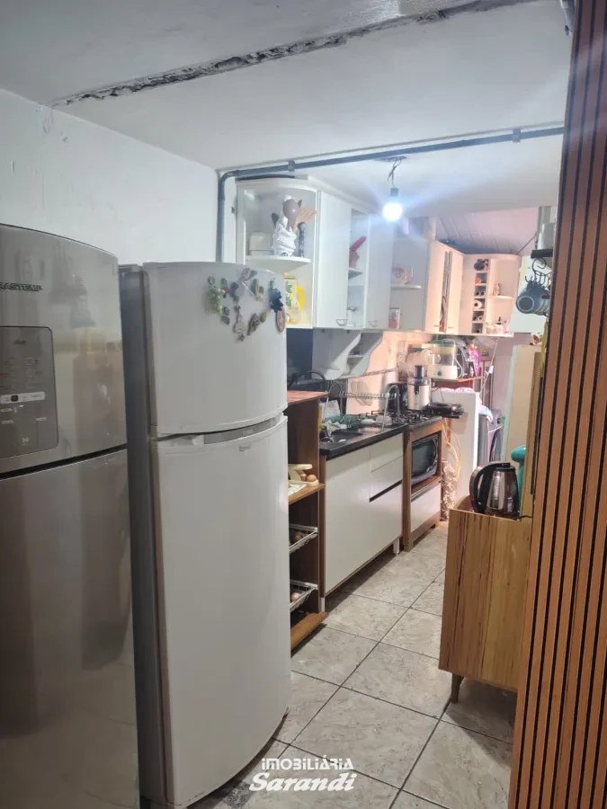 Imagem de Casa de Alvenaria com três dormitórios com garagem situada no bairro Costa e Silva Porto Alegre