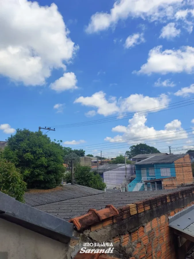 Imagem de Casa de Alvenaria com três dormitórios com garagem situada no bairro Costa e Silva Porto Alegre