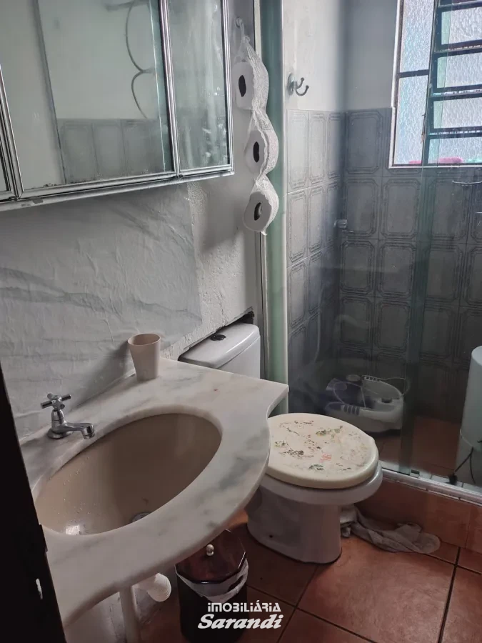 Imagem de Casa de Alvenaria com três dormitórios com garagem situada no bairro Costa e Silva Porto Alegre