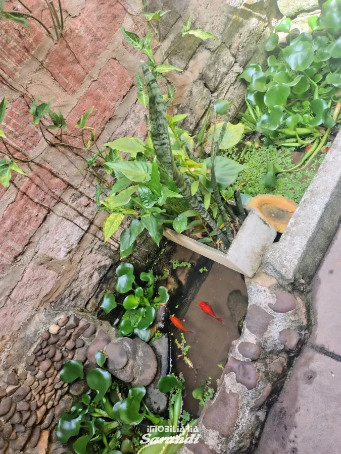 Imagem de Casa de Alvenaria com três dormitórios com garagem situada no bairro Costa e Silva Porto Alegre