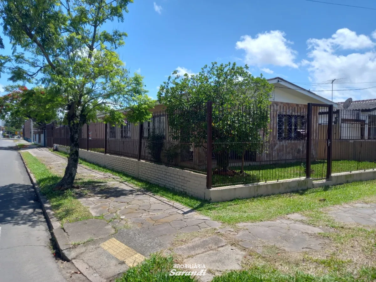 Imagem de Casa de alvenaria de esquina Jardim Ingá três dormitórios um com suíte Porto Alegre